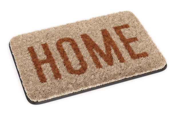 istock Brown welcome coir doormat isolated on white 1182901538