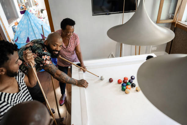 istock Family playing snooker together 1182903176