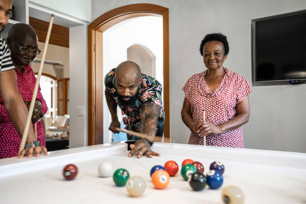 istock Family playing snooker together 1182903232