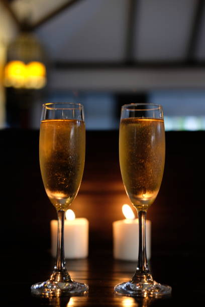 Champagne glass on wooden counter