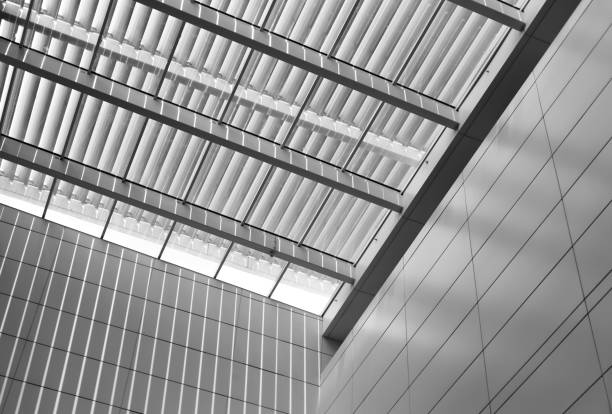 istock Backlit louvered ceiling,Sun shine comes in 1182905082