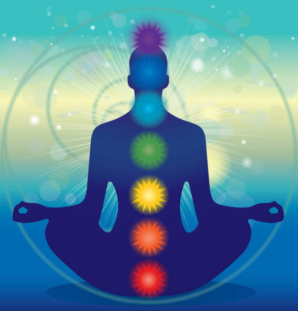 Meditating Man Silhouette In Lotus Pose And Chakras Silhouette of a meditating man in lotus pose with chakras placed on mystic background. chakra illustrations stock illustrations