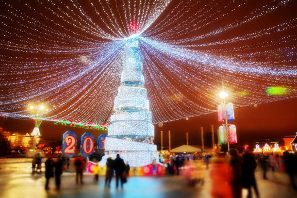 istock Christmas tree with gifts and decorations 2020 1182907356