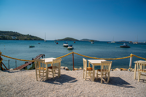 Skiathos Greece June 09   2019: Beautiful traditional tavern  on the picturesque beach on Skiathos island, Greece.