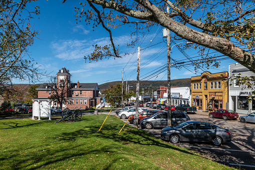 Annapolis Royal, Canada. October 3, 2019: Shops and buildings in the town of Annapolis Royal, Nova Scotia. Cars parked on the street.