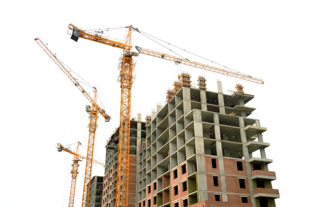 istock Construction site, building a new house, cranes, white sky background 1182910176