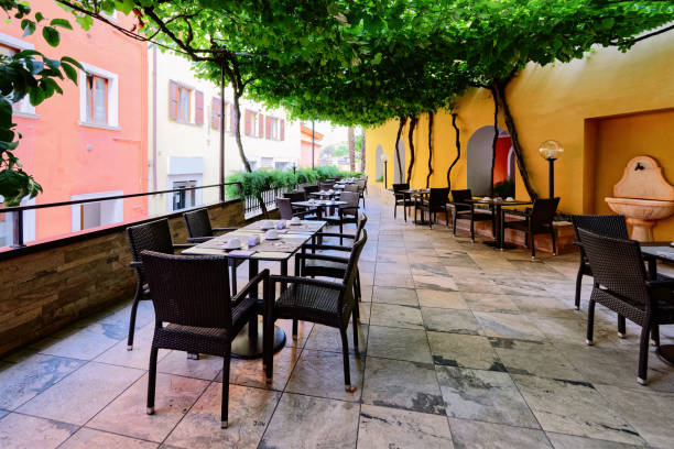 istock Terrace and Hotel breakfast restaurant interior on background architecture 1182911734