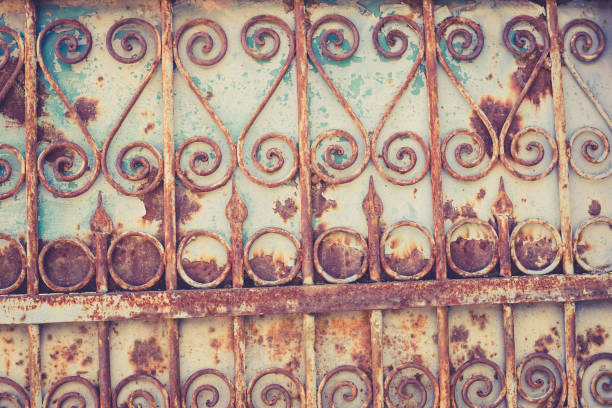 close up detail of an olr rusty gate  isolated on a natural background