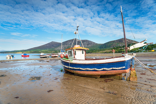 A fishing boat on the beach at Trefor on the Llyn Peninsula in North Wales