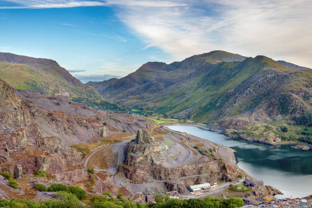 Mount Snowdon in Wales Looking out from Dinorwig Quarry across Llyn Padarn lake to Mount Snowdon mount snowdon photos stock pictures, royalty-free photos & images