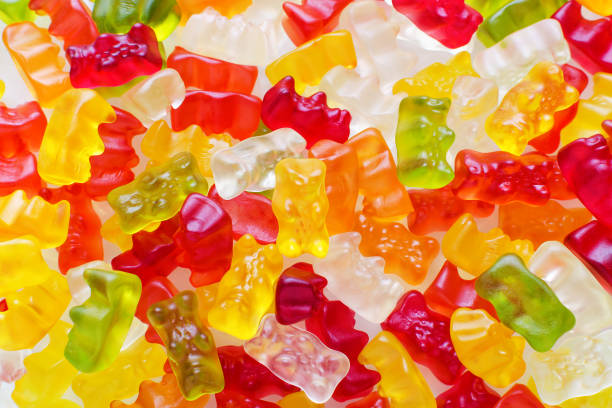 красочные желе конфеты фон крупным планом, вид сверху - gelatin dessert multi colored vibrant color celebration стоковые фото и изображения