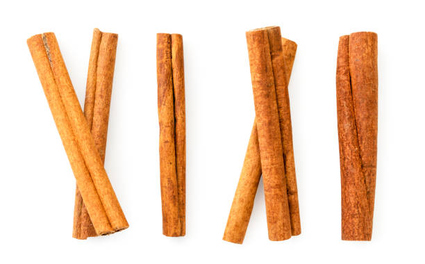 istock Cinnamon sticks on a white. The view of the top. 1182914239