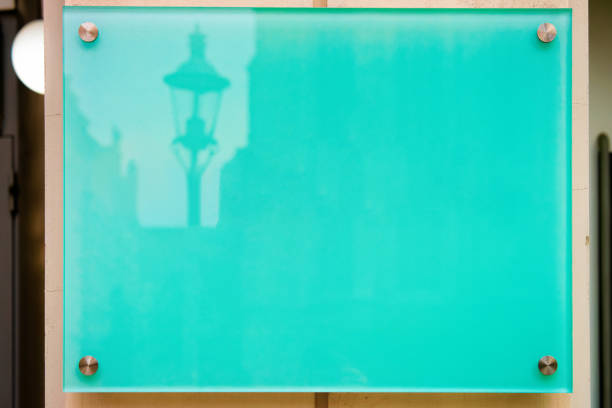 Blank Street plate on building wall in Vienna, Austria. Empty name sign board on house in Innere Stadt in Wiena. Place for copy space. Concept and architecture. Texture and background. Blue color