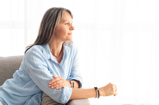 istock beautiful middle aged woman resting 1182915889