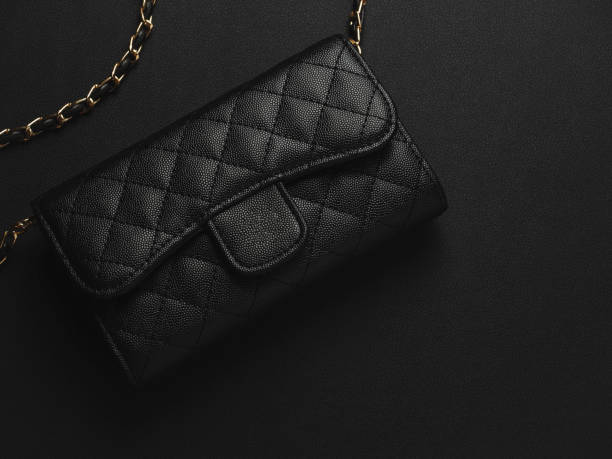istock Black leather bag with golden chain 1182915982