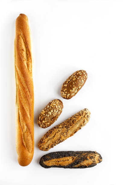 istock assorted  homemade bread on dark wood background 1182916018