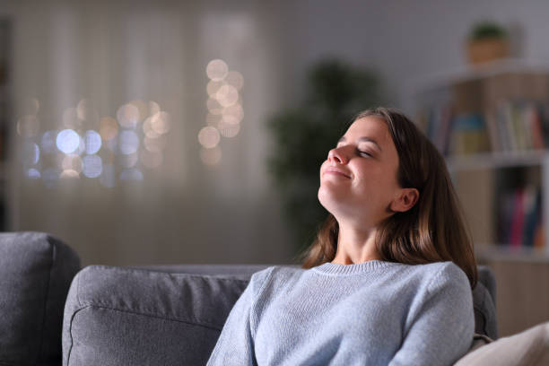 istock Relaxed homeowner breathing deeply fresh air at home 1182918242