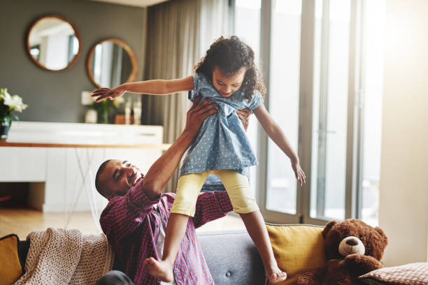 istock It's playtime between father and daughter 1182920048