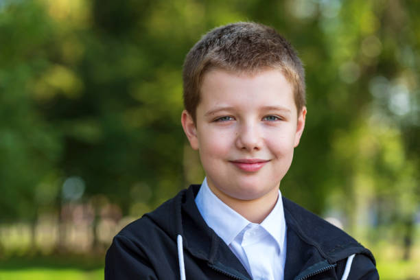 istock Portrait of smiling 10 year old boy. 1182920468