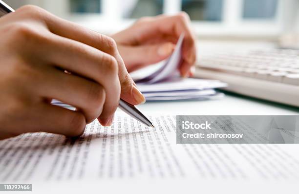 Closeup Of Human Hands Doing Paperwork Stock Photo - Download Image Now - Writing - Activity, Report - Document, Handwriting