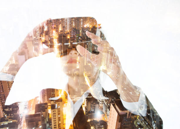 istock Multiple exposure of businesswoman using the virtual reality simulator 1182925134