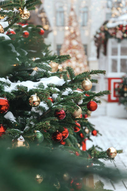 istock Christmas tree background and Christmas decorations with snow, blurred, sparking, glowing. 1182925519
