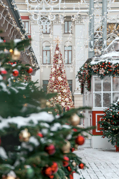 istock Christmas tree background and Christmas decorations with snow, blurred, sparking, glowing. 1182925533