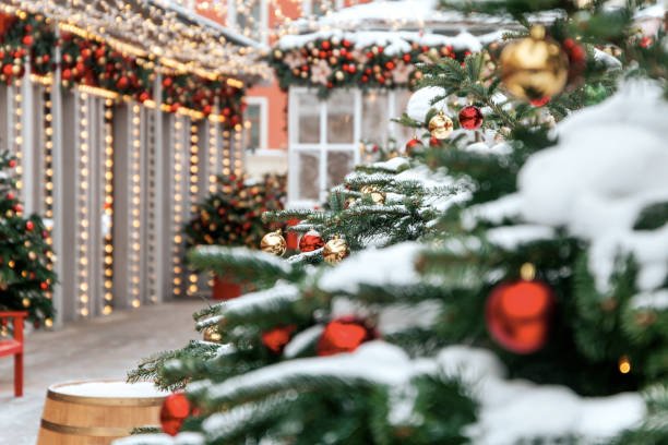 istock Christmas tree background and Christmas decorations with snow, blurred, sparking, glowing. 1182925650
