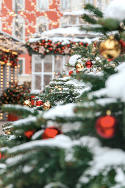 istock Christmas tree background and Christmas decorations with snow, blurred, sparking, glowing. 1182925796