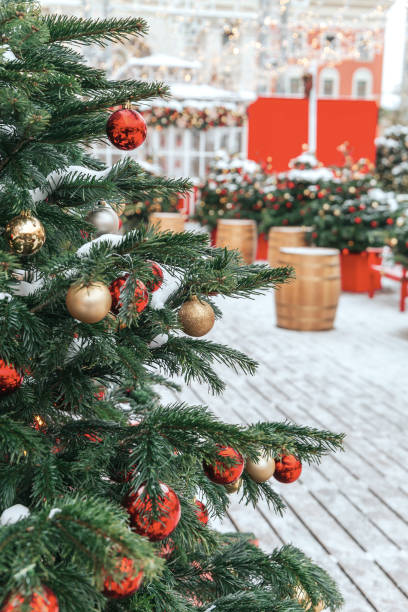 istock Christmas tree background and Christmas decorations with snow, blurred, sparking, glowing. 1182925807