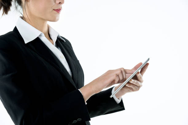 istock Businesswoman holding digital tablet on white background 1182929058