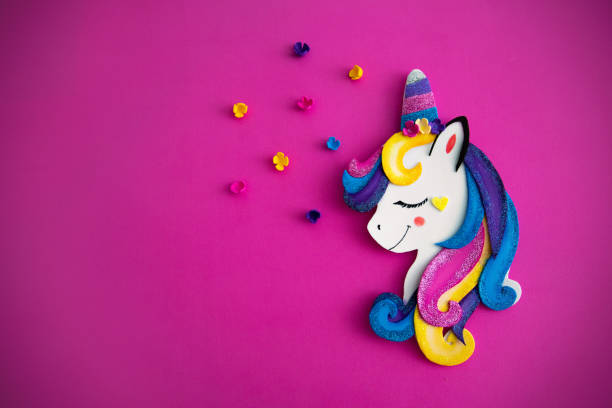 istock Colorful and fun unicorn background 1182930631