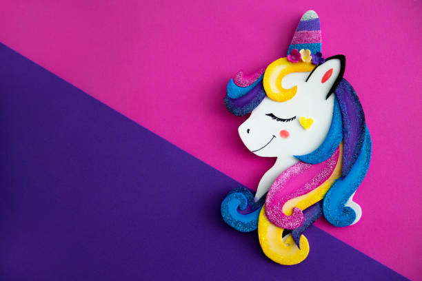 istock Colorful and fun unicorn background 1182930632