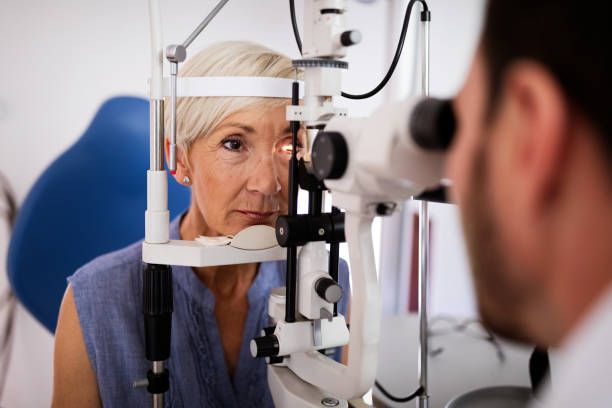 Ophthalmology concept. Patient eye vision examination in ophthalmological clinic Ophthalmology concept. Senior woman eye vision examination in ophthalmological clinic glaucoma photos stock pictures, royalty-free photos & images
