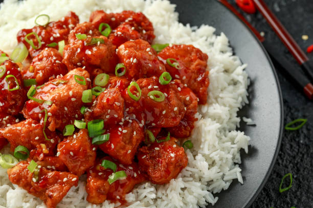 istock Tso's chicken with rice, green onion and broccoli 1182939692