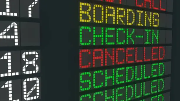 Photo of Cancelled flight sign airport table, international departures schedule cancel