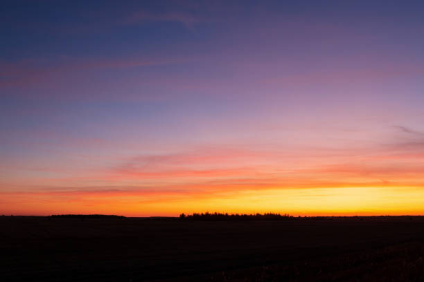 istock colorful clouds in the sky during sunset 1182943039