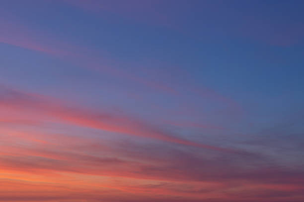 istock colorful clouds in the sky during sunset 1182943103