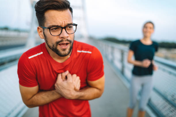 istock Man feeling pain in heart during exercise outdoor 1182948136