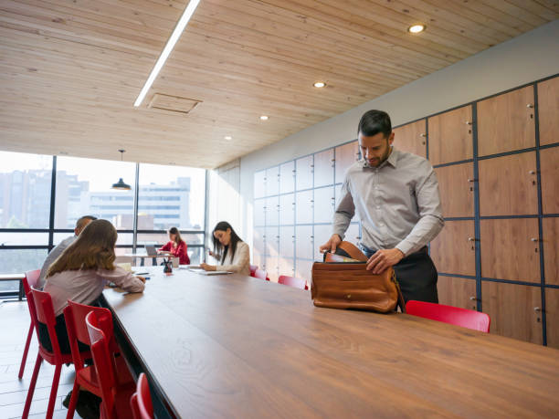 Business man arriving to work at a co-working space