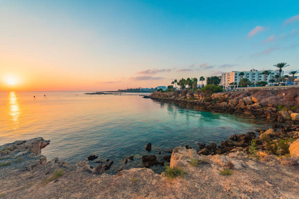 Fig tree bay beach in Protaras, Cyprus Beautiful beaches of Cyprus at sunset cyprus agia napa stock pictures, royalty-free photos & images