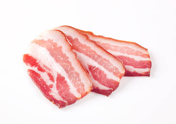 Slices of cured bacon stock photo