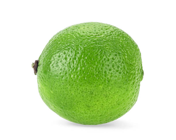 istock Fresh green lime isolated on white background. Tropical fruit. 1182952670