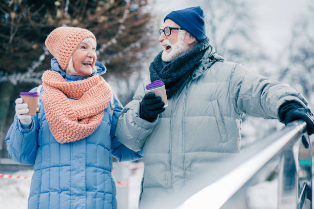 istock Aged people laughing at the funny joke while walking 1182953182