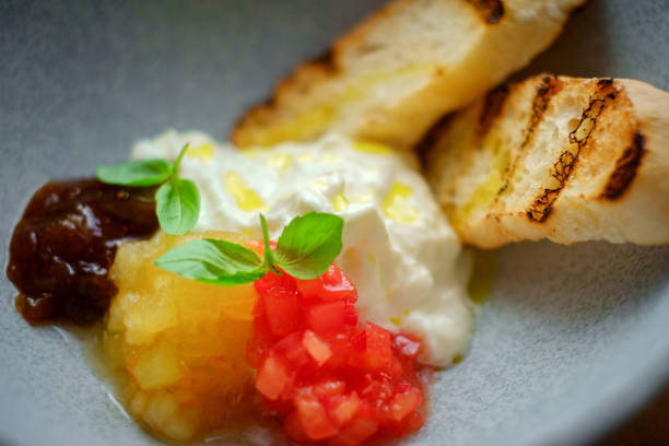 istock jam with cream cheese, sweet bruschettas, macro 1182953439