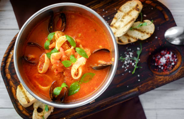 istock tomato soup with seafood, cacciucco, top view 1182953461