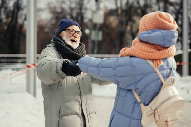 istock Pensioners feeling good while dancing outdoors 1182953644