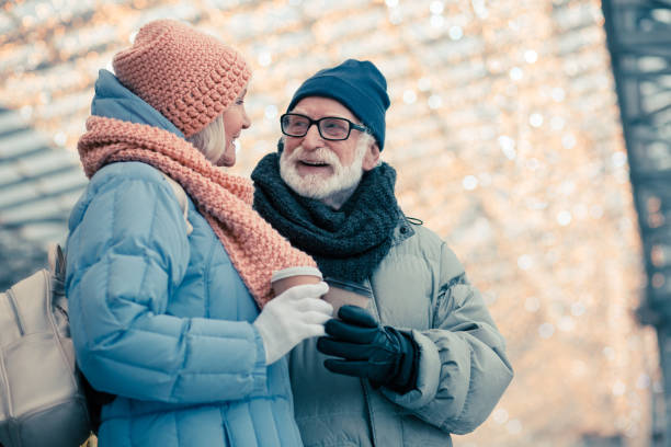 istock Beautiful senior couple having pleasant talk 1182954557