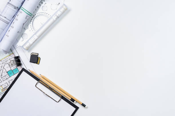 istock Architectural plans, pencil and ruler on the table. Place for your text 1182954743