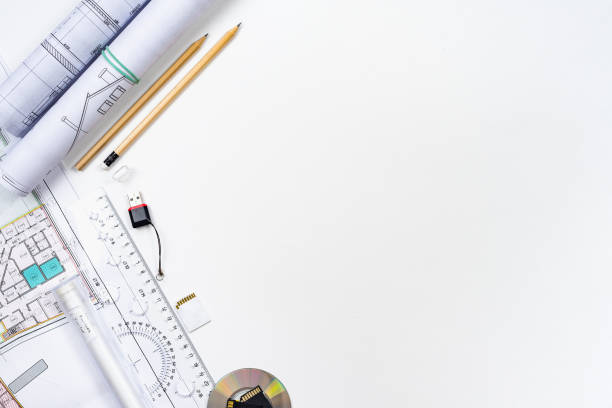 istock Architectural plans, pencil and ruler on the table. Place for your text 1182955059